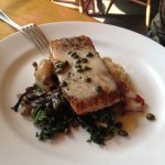 Curried Lemon Caper Sauce over a Pan Seared Salmon with Mushrooms and Kale